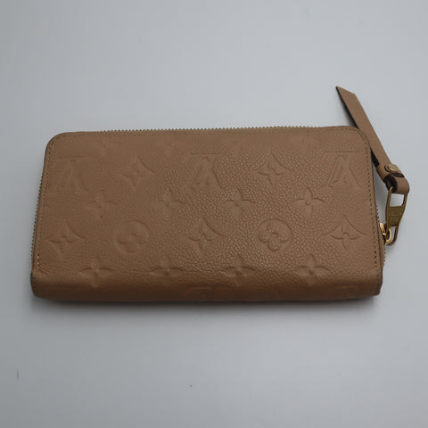 Pre-Owned #71463 Louis Vuitton Monogram Empreinte Zippy Wallet Leather Beige M69034